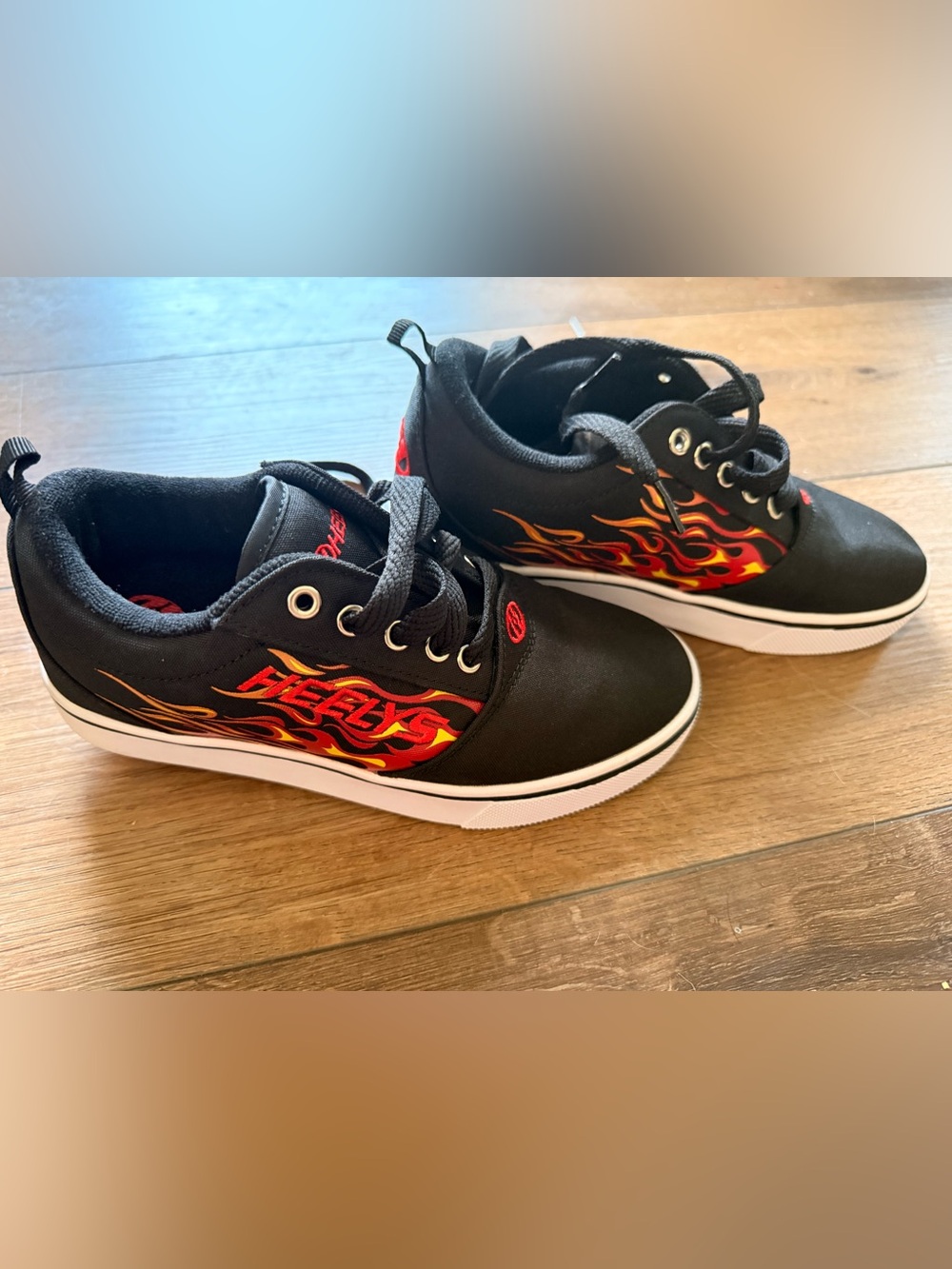 Heelys Black Kids Sneakers with Red and Orange Flame Graphics